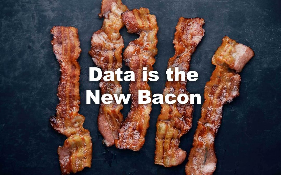 Graphic that says "Data is the New Bacon" over image of bacon